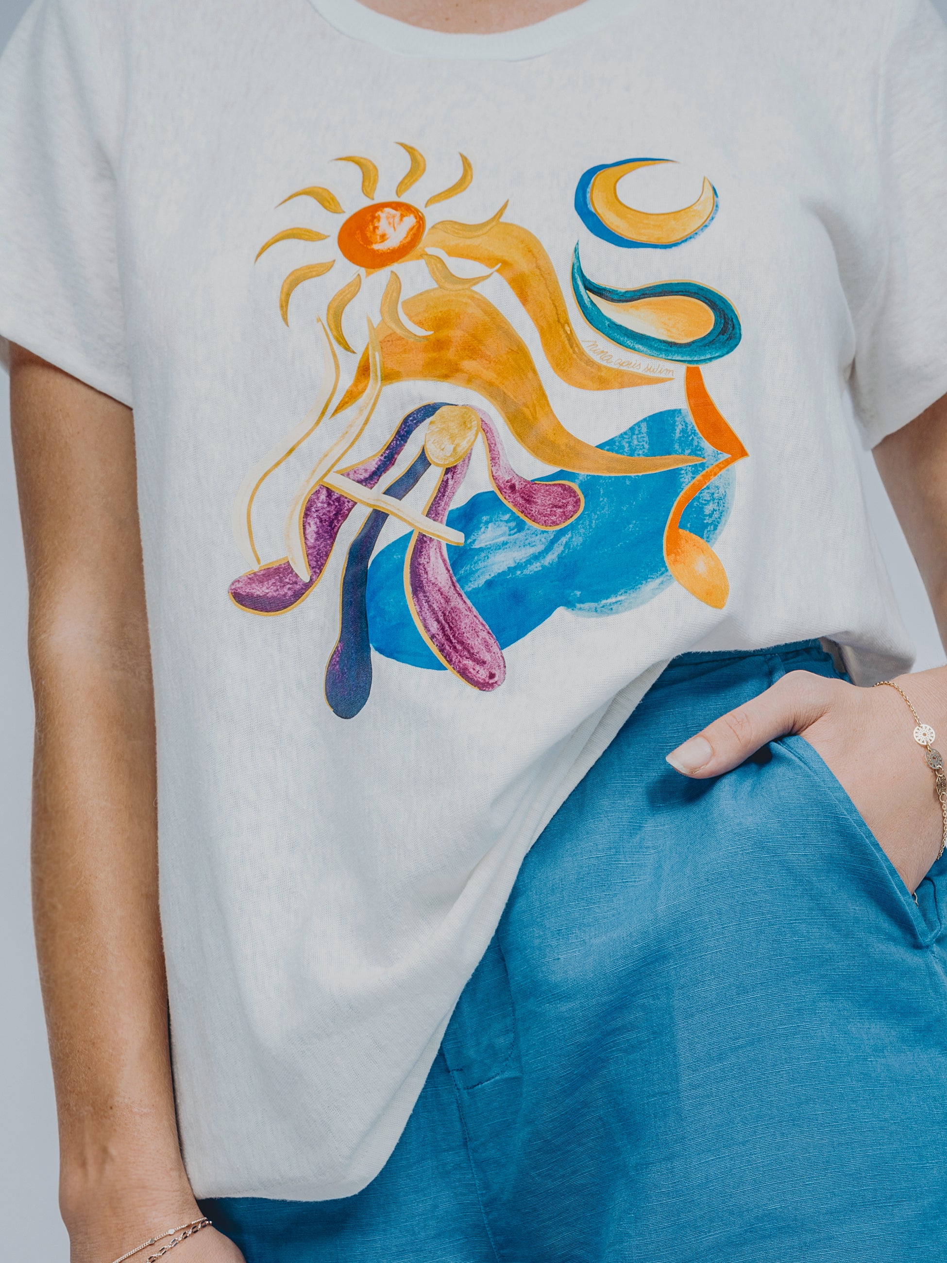 Close-up of Chroma T-shirt premium 100% linen jersey fabric and vibrant, artistic print detail