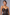 model wearing vegan leather chocolate brown dress, front detail